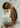 Two complementary silk hair ribbon scarves tied in hair, At Home With Ray Florescence silky in ivory and caramel