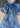 Brigt blue watercolored background of a retro cowgirl design silky ribbon scarf